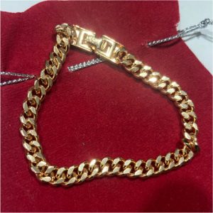 Manilla dorada bordada gruesa