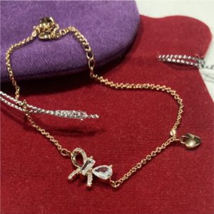 Pulsera dorada mariposa en circonio